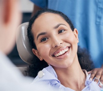 A young woman about to receive treatment for gum disease