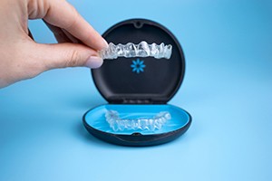 An Invisalign aligner in a protective case