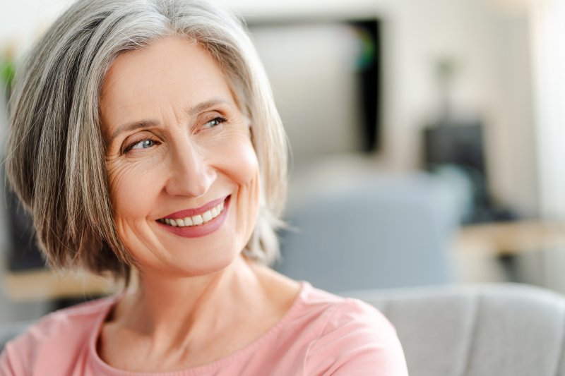 older woman with dental implants