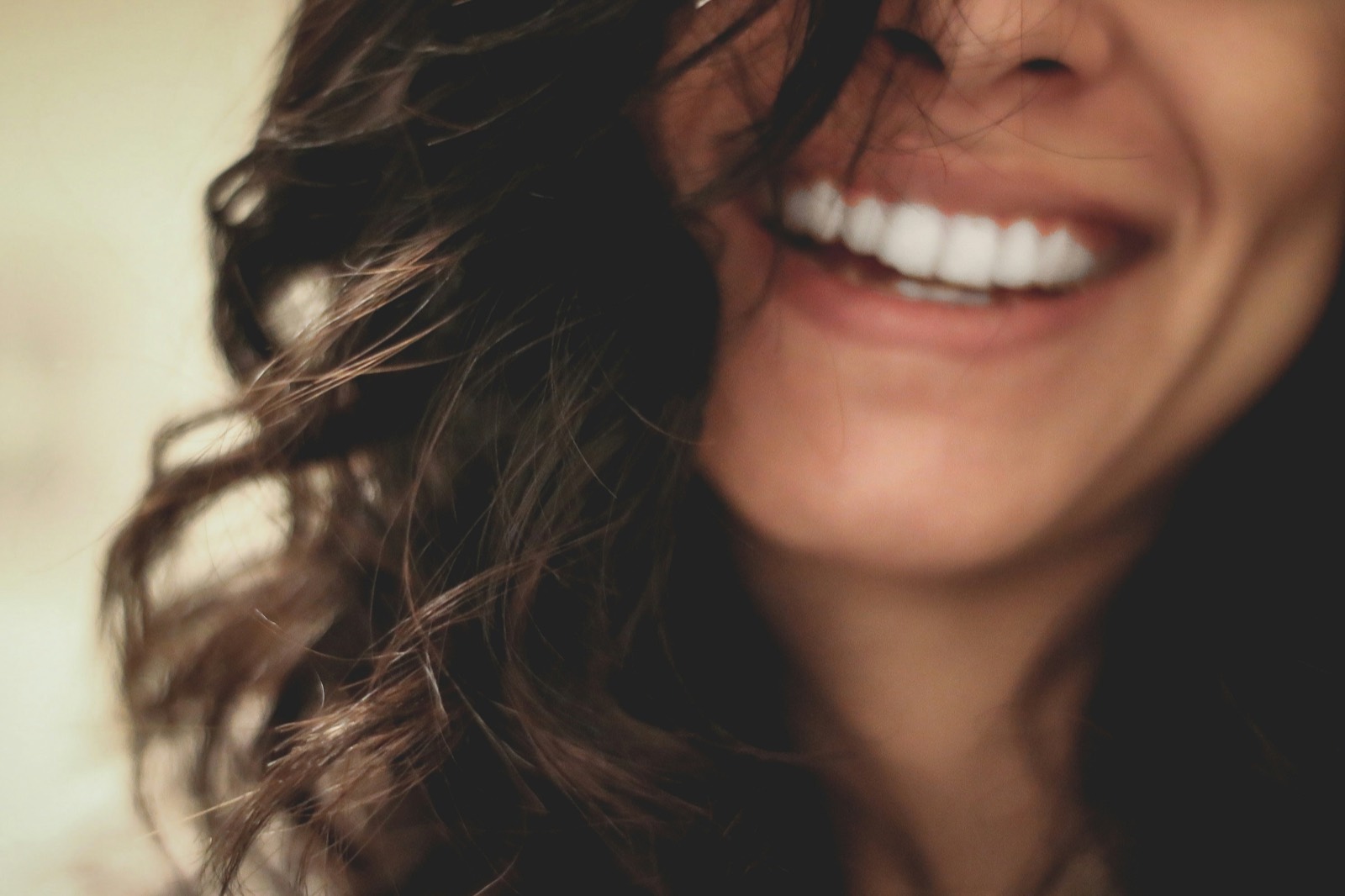 Woman smiling confidently with bright, natural-looking teeth