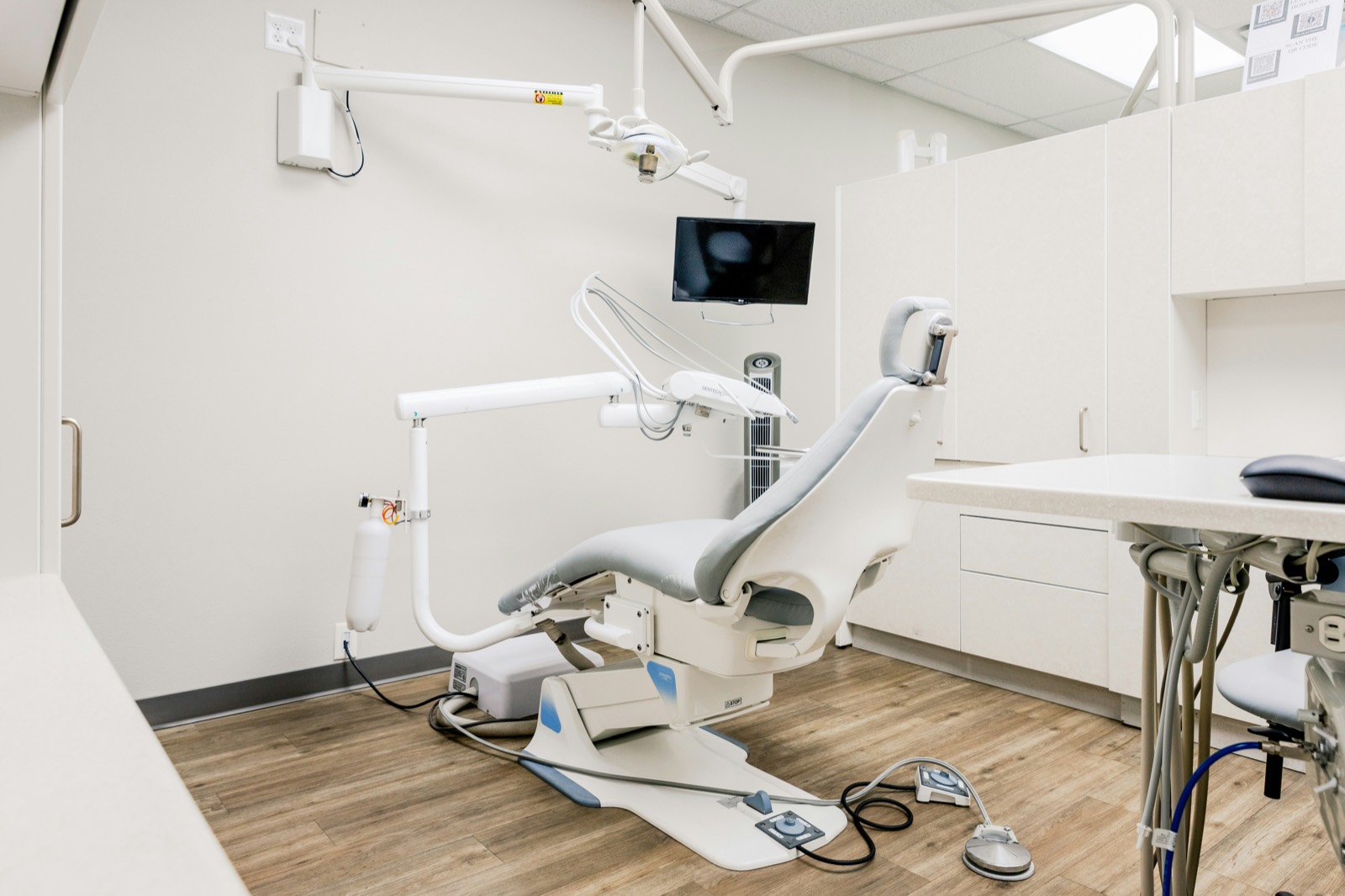 Clean, modern dental treatment room ready for a post-operative visit