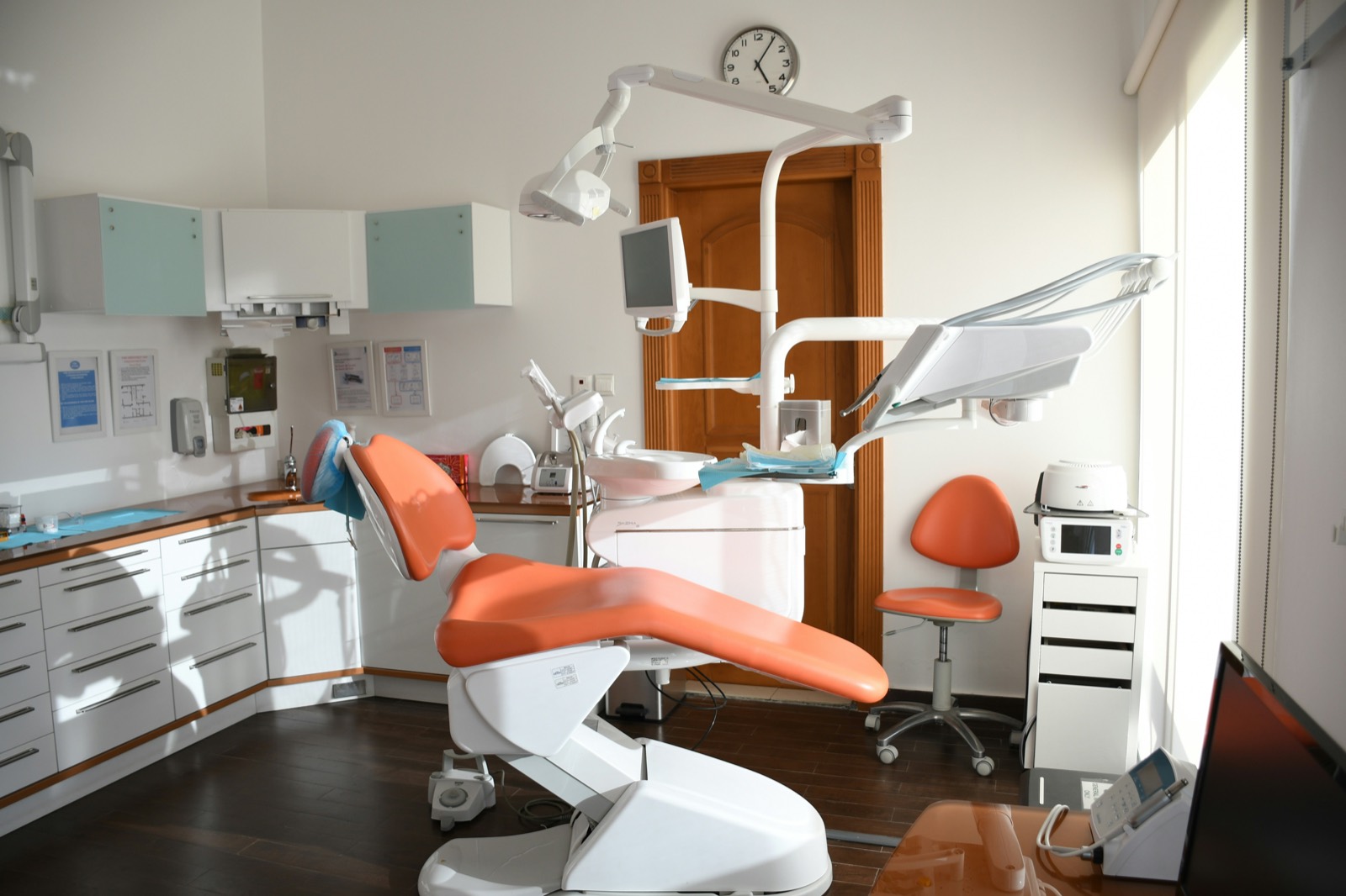Clean, sunlit dental operatory prepared for a checkup and cleaning appointment